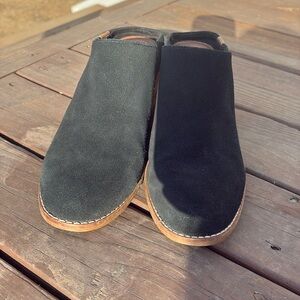Tom’s black suede slip mules